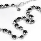Kin Onyx Necklace, close view of the pattern hand carved on the side of each setting - Ryan Christian